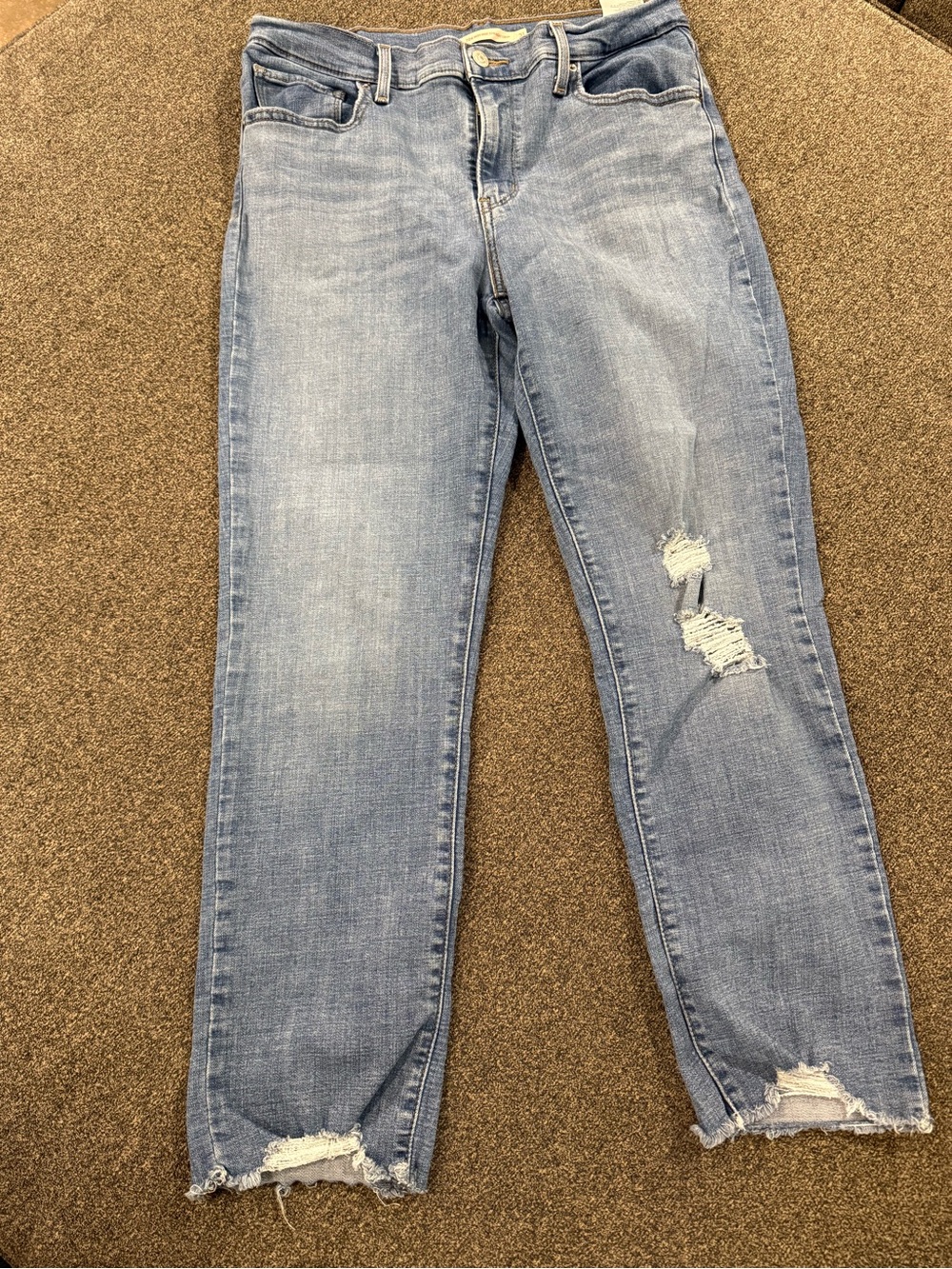 Levi’s Women's Light Blue Distressed ankle Jeans